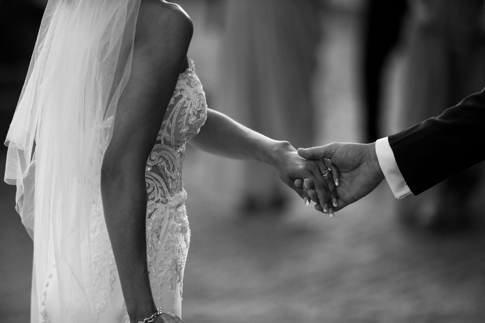close up of a couple holding hands