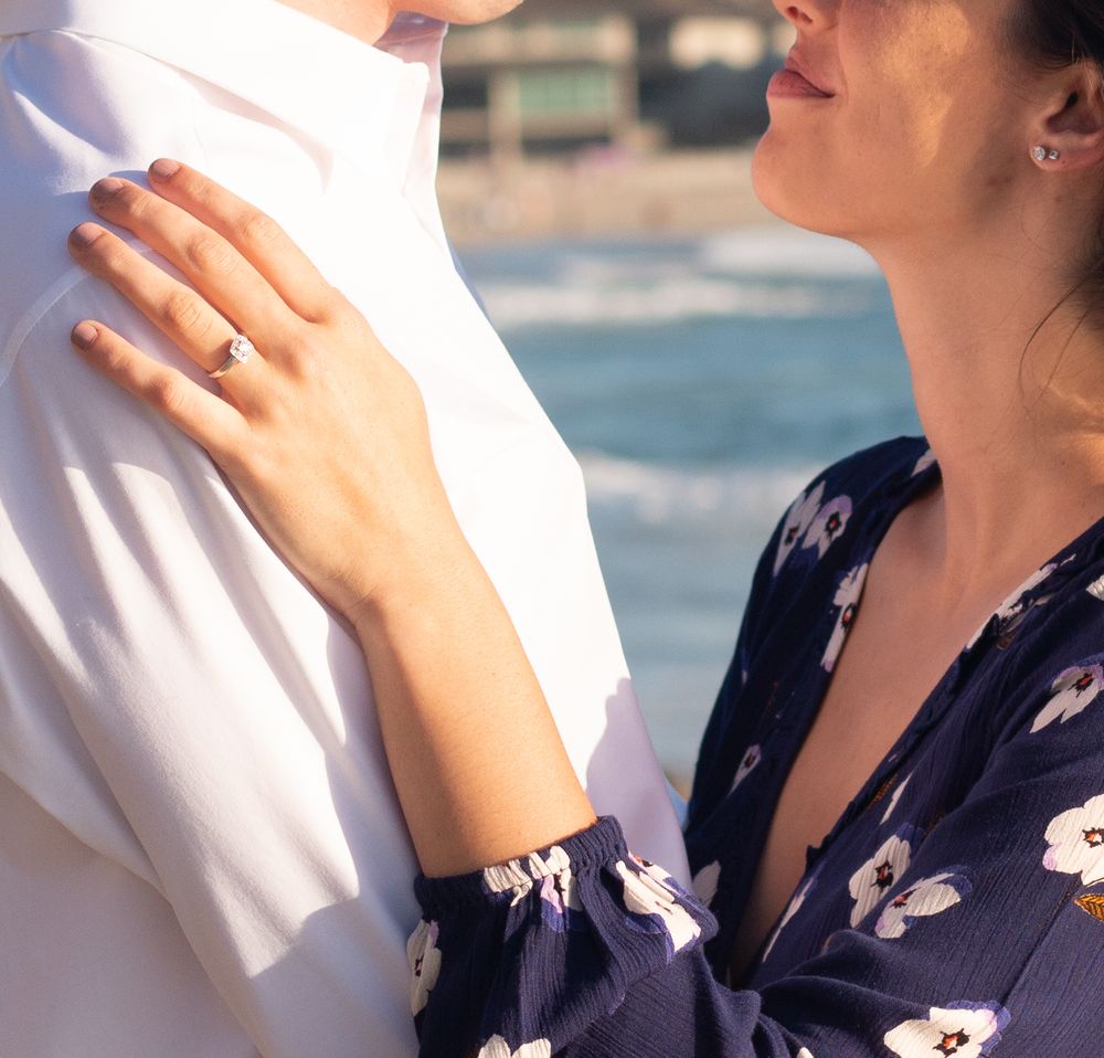 Engagement session focusing on the ring in Laguna Beach