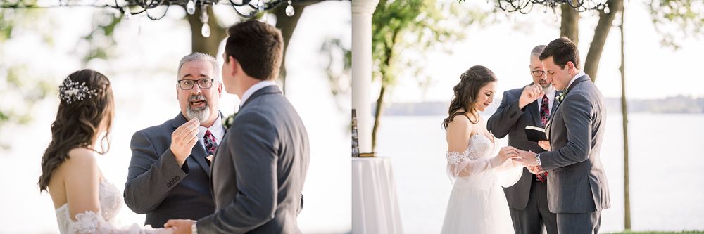 Intimate outdoor wedding ceremony under trees by the water.