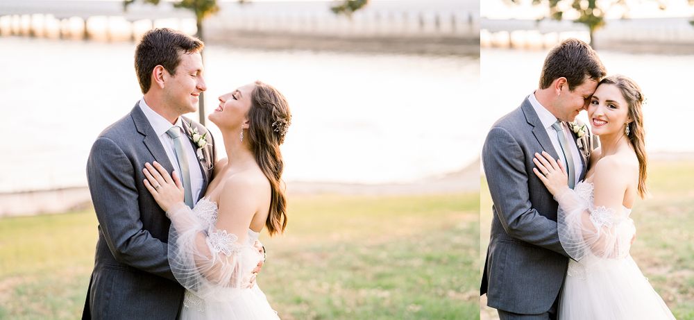 A couple shares an intimate moment outdoors during a wedding photoshoot at sunset.