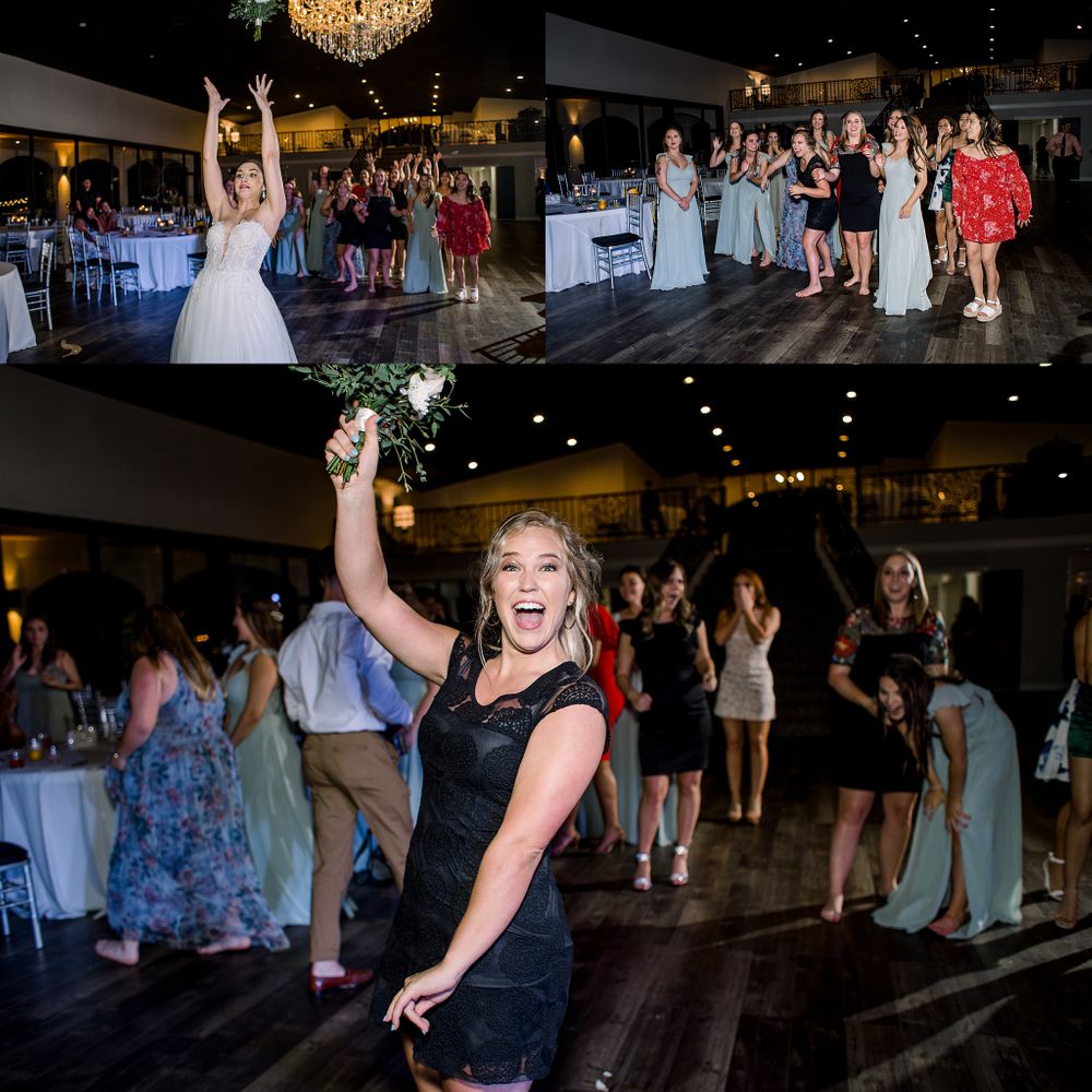 Wedding celebration with bouquet toss and dancing guests under elegant chandeliers.