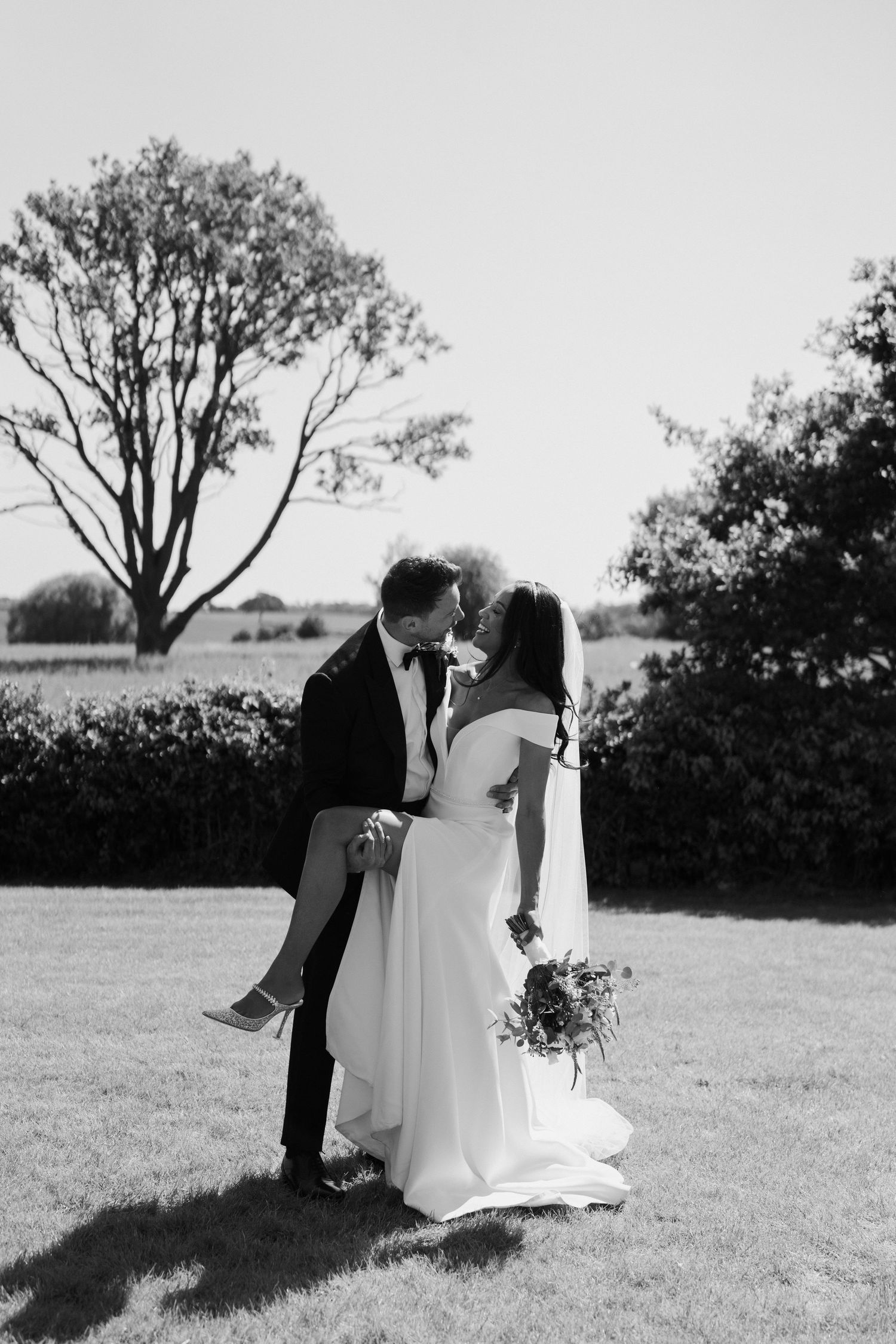 bride-and-groom-laughing-stockton-house-wedding-shropshire