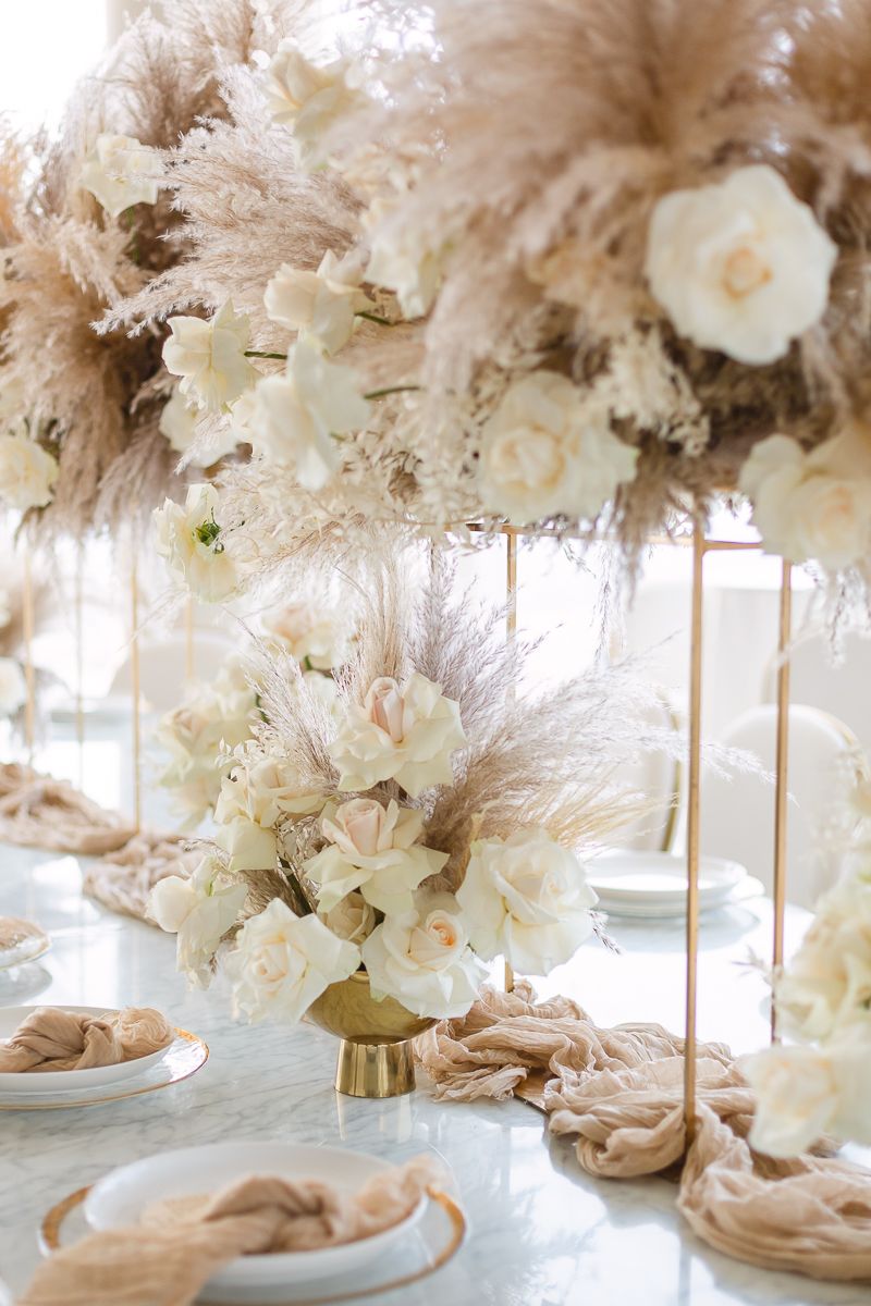 a detail view of a white rose floral arrangement at Hudson Yards by Paula Ortiz NY Family Photographer