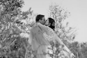 Johane and Wichert share a kiss in the bushveld of South Africa.