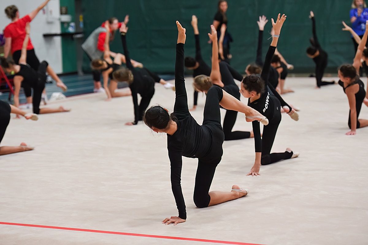 Rhythmic gymnast hip stretch warm up