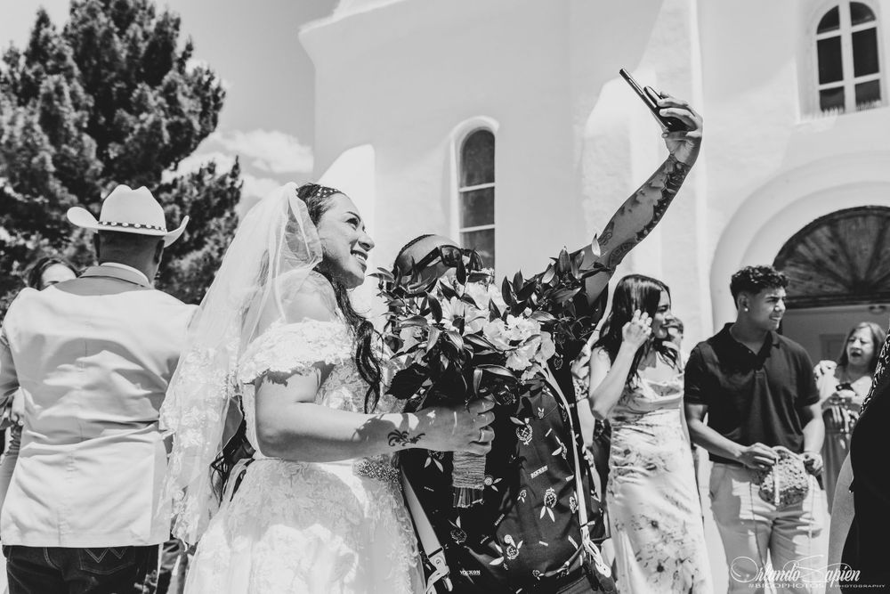 Black and white wedding celebration photos showing joyful dancing and festivities.