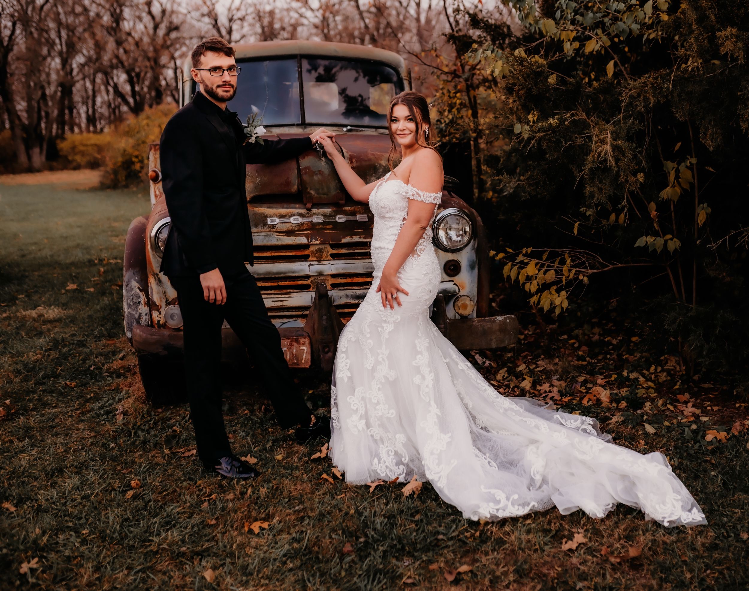 Bride and Groom next to vintage truck