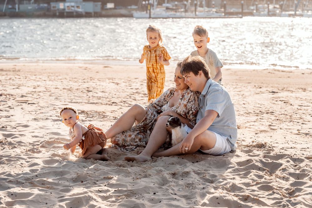 Dynamic family photoshoot with a dog in Sydney