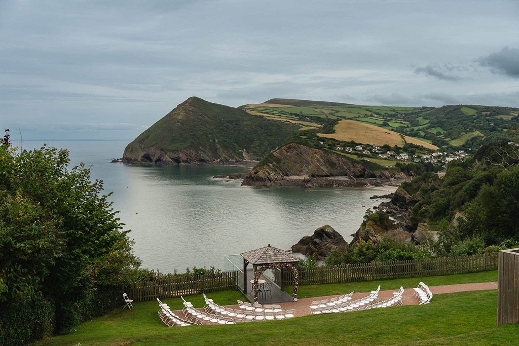 Sandy Cove Wedding Venue in Devon overlooking the sea and coastline by Devon Wedding Photographer