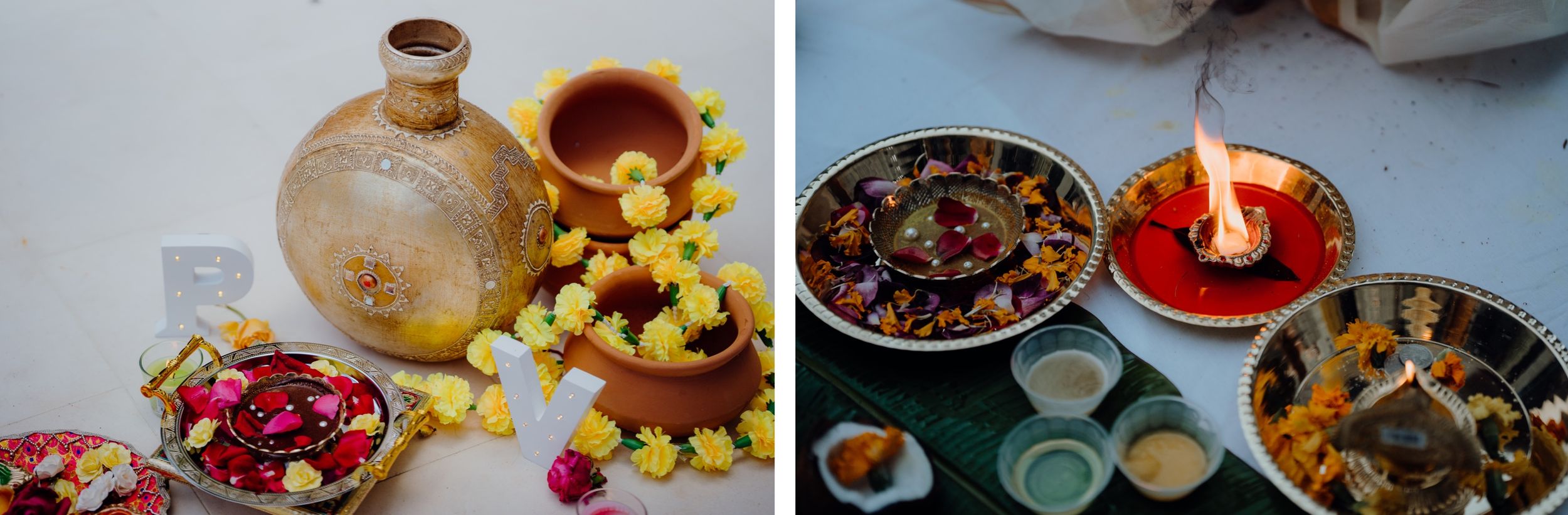 Traditional Indian puja items with flowers, oil lamps, and ritual offerings arranged on plates.