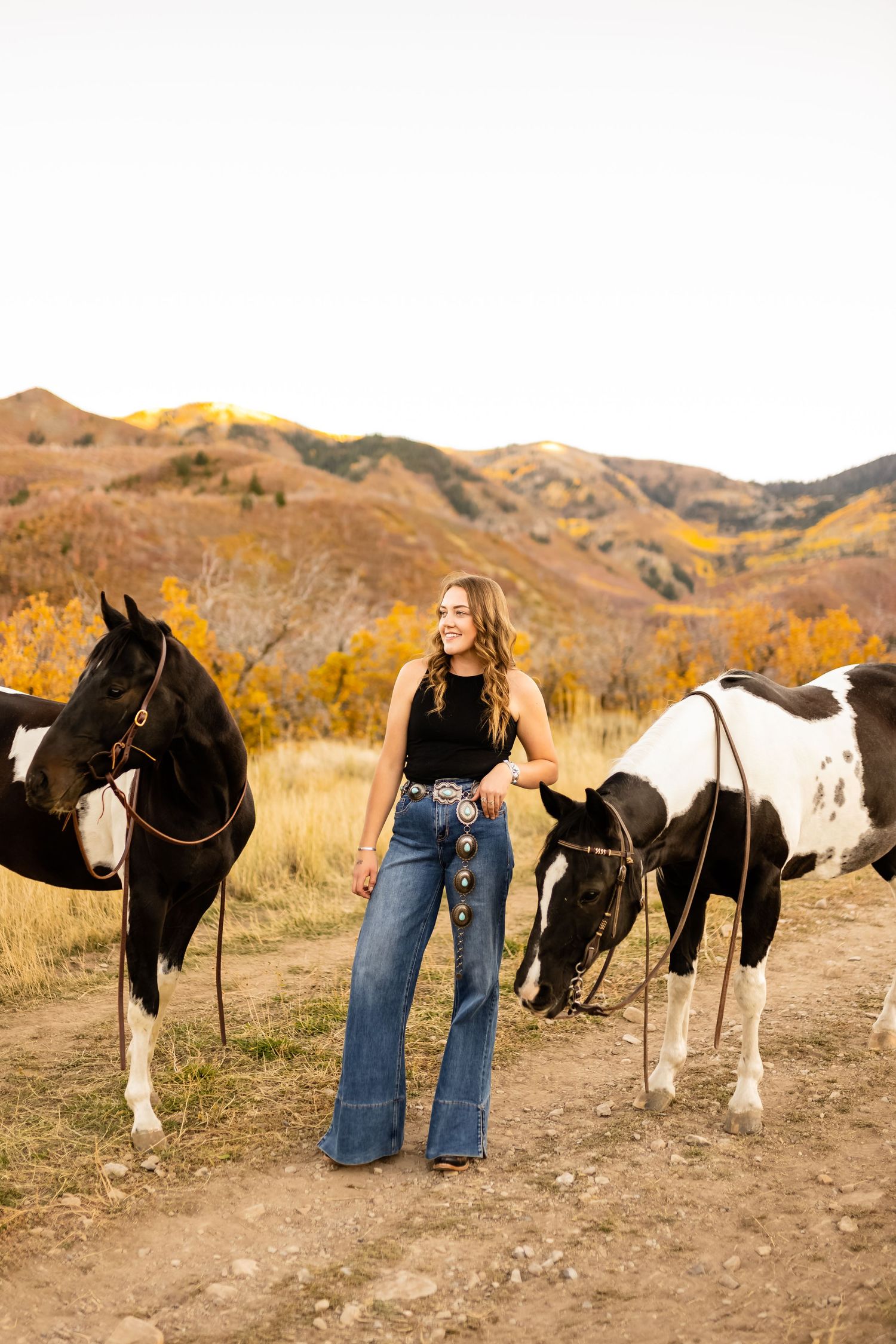 A series of photos showing a horse and rider in a scenic autumn mountain landscape.