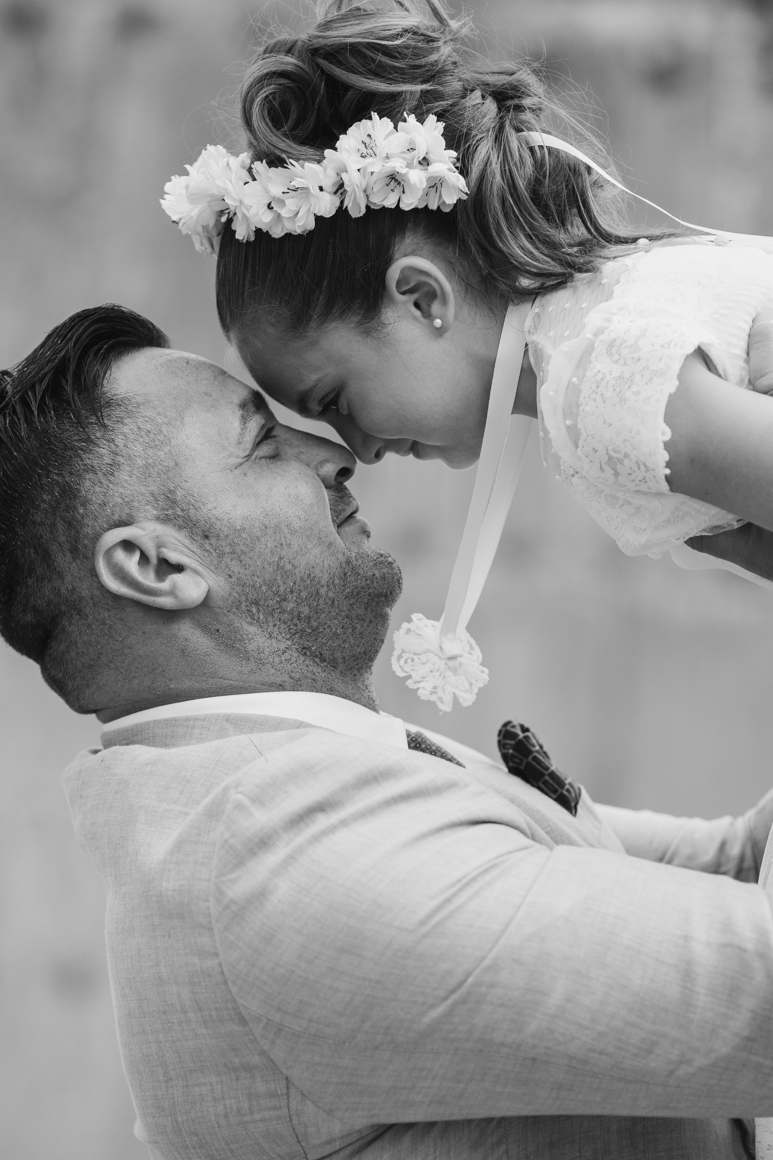 Black and white close-up wedding photos showing tender romantic moments.