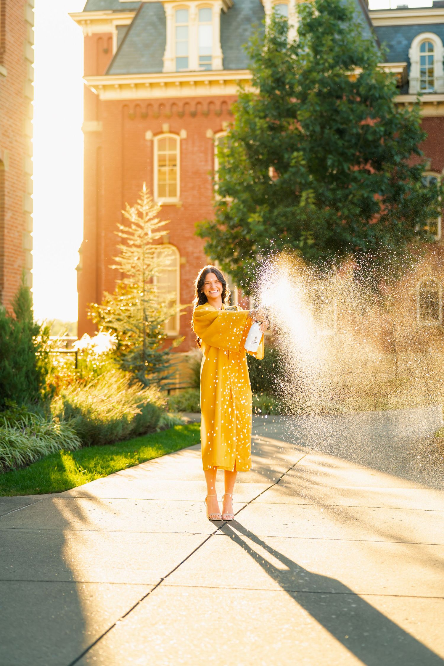 College Graduations Senior Session in WV on WVU football field.