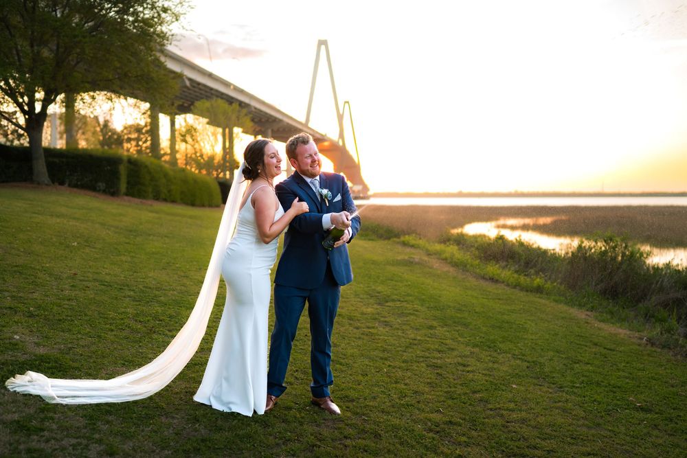Bride and groom at sunset with Charleston bridge in the background , South Carolina wedding photography
Engagement, Couples, Elopements