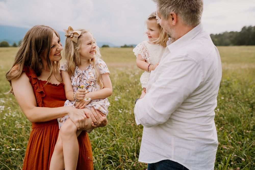 Family plays together during smoky mountains photography session