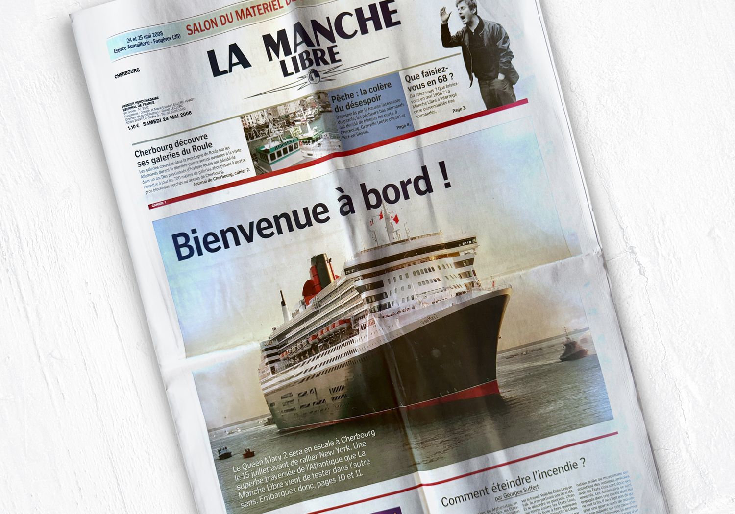 Front page of La Manche newspaper featuring a large cruise ship with the headline 'Bienvenue à bord!'.
