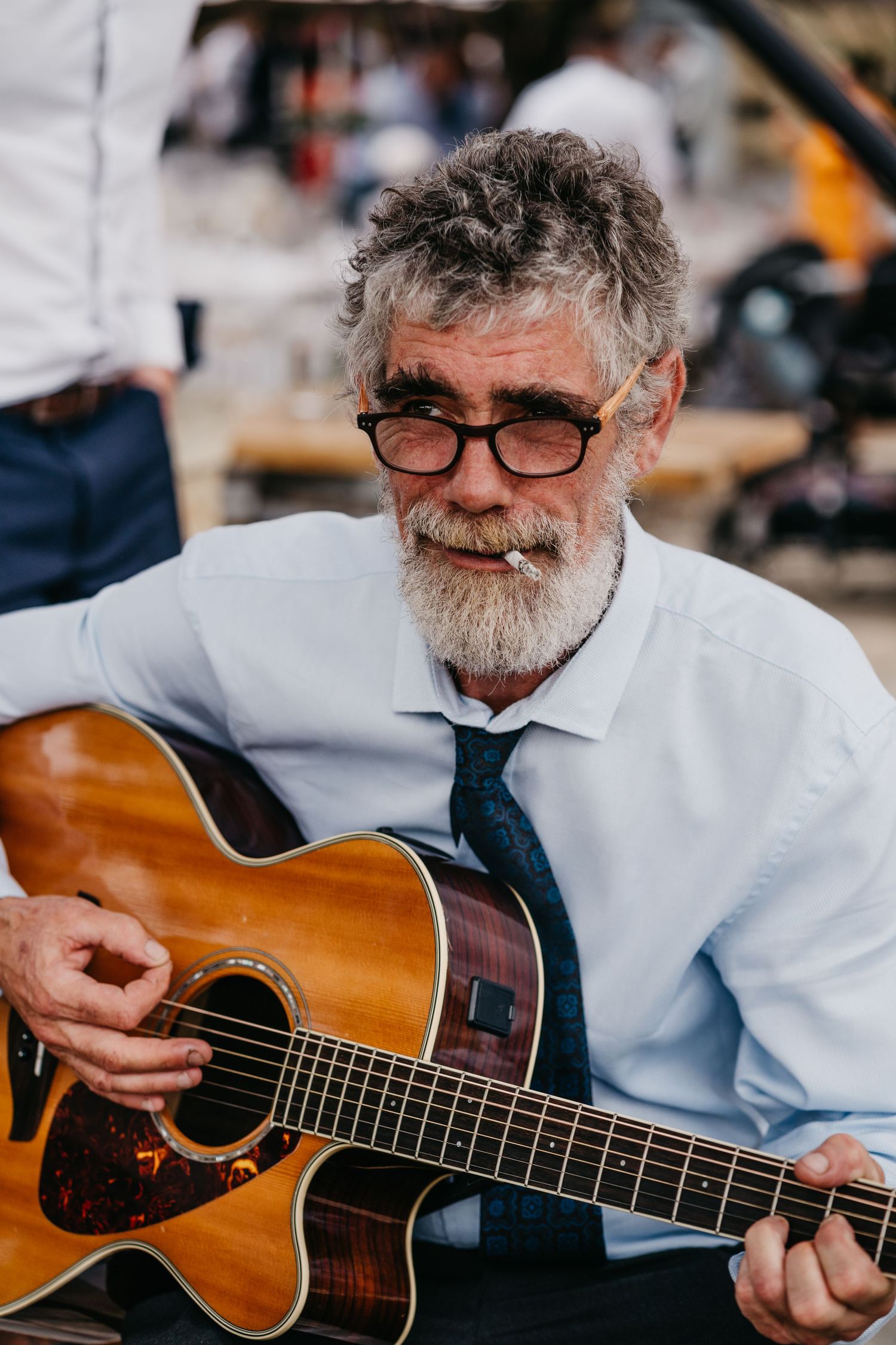 singer smoking a cigarette