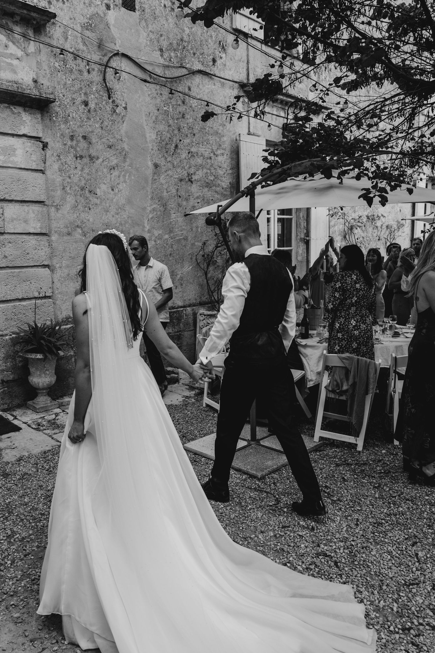bride and groom walking at Chateau Lagorce