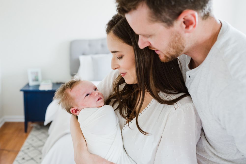 mom-and-dad-gazing-loving-at-baby