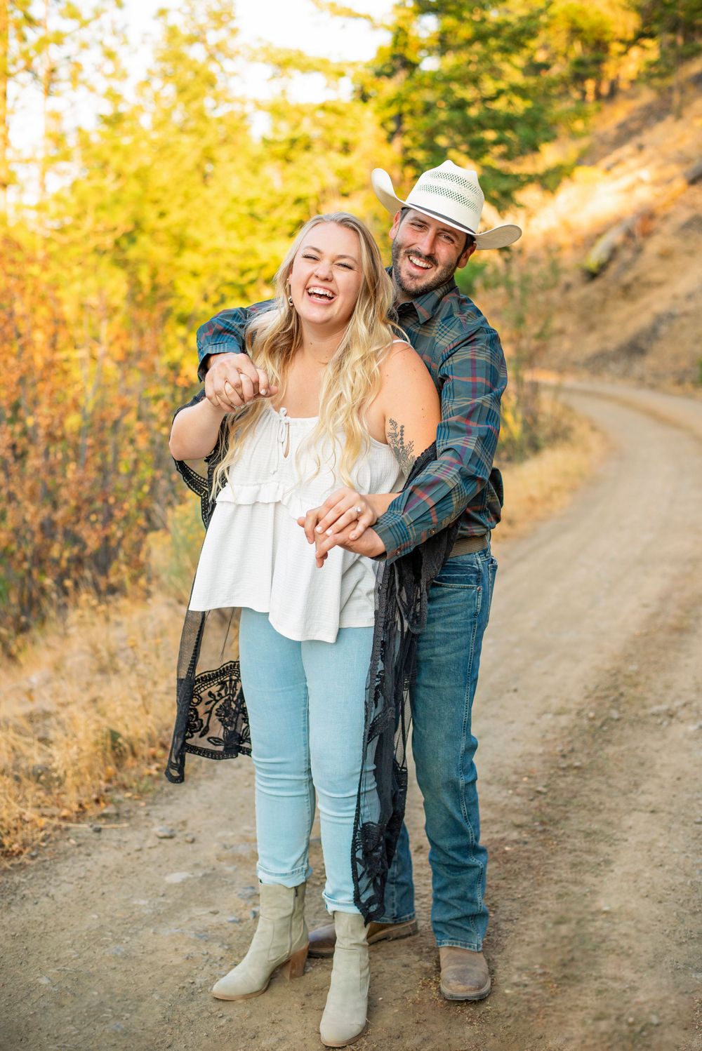 An engaged couple pose for their engagement photoshoot in Ellensburg, Washington.