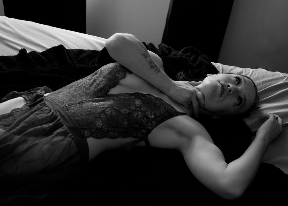 Professional Boudoir Session taken in home as lifestyle shoot in Magna, UT.