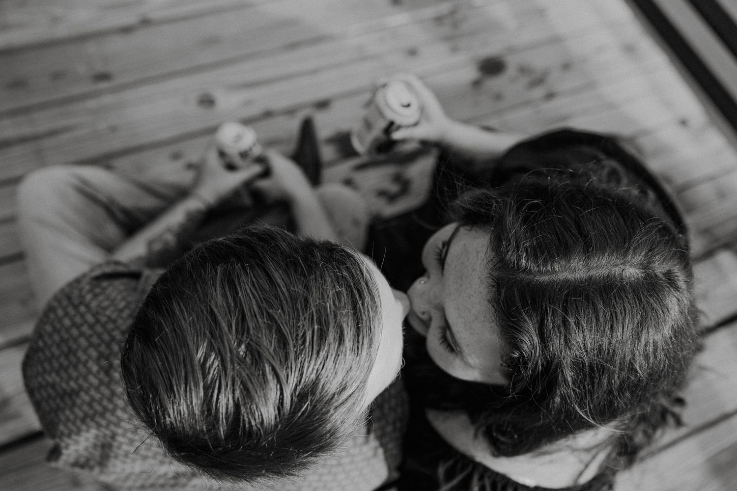 Black and white artistic portrait shot of couple in intimate moment.