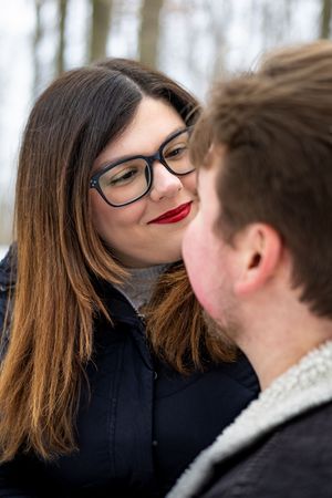 A tender moment captured in a series of frames showing an intimate conversation between two people in close proximity.
