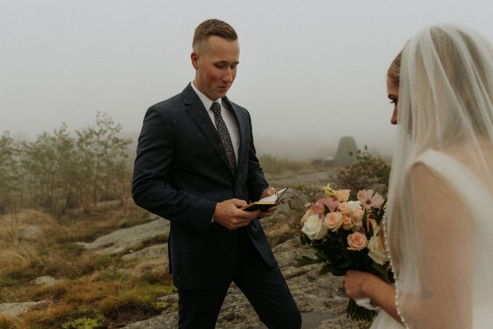 artistically Alexia photography m and j elopement groom reading vows