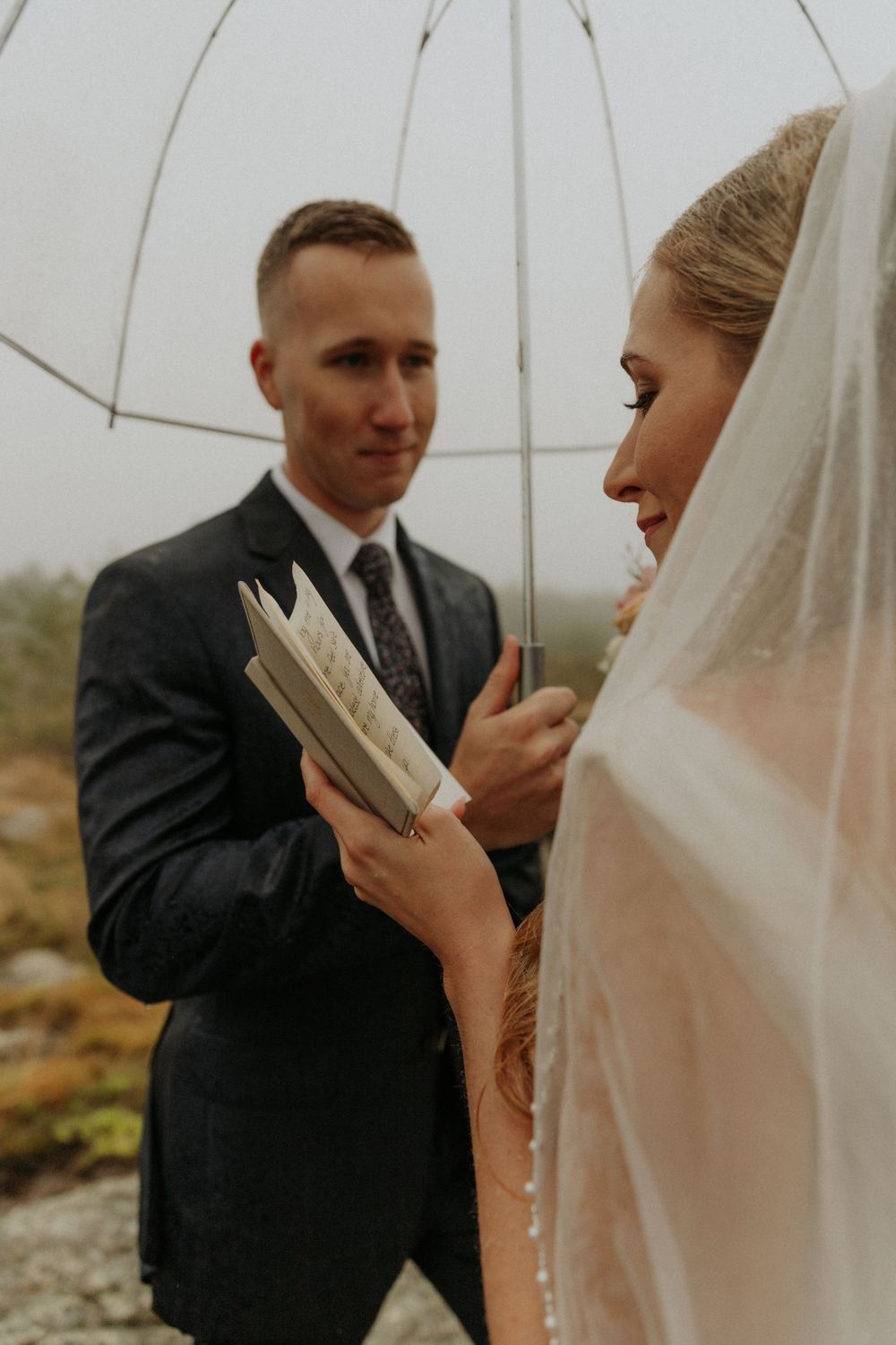 artistically Alexia photography m and j elopement bride reading vows to groom