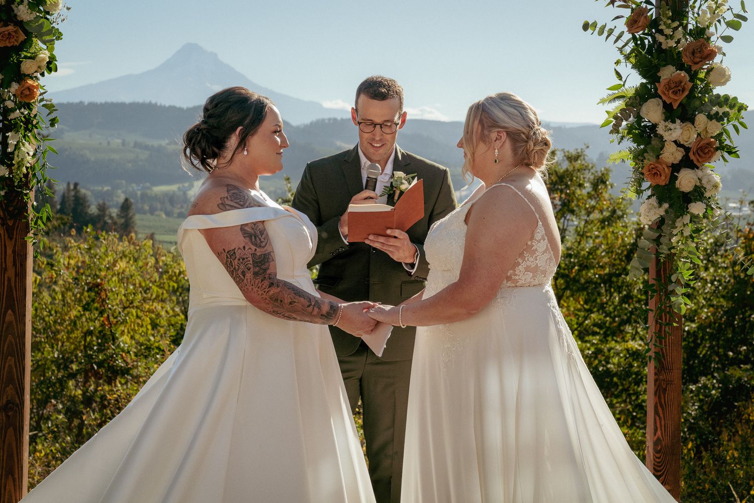 Lesbian couple marries with Mt Hood views, Oregon outdoor ceremony.