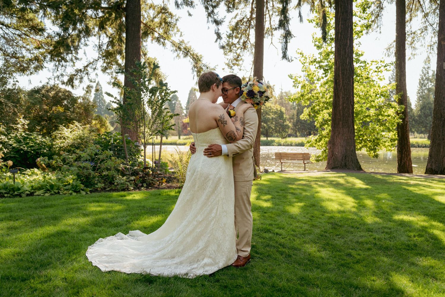 Couple's first dance in lush Oregon forest, romantic PNW wedding.