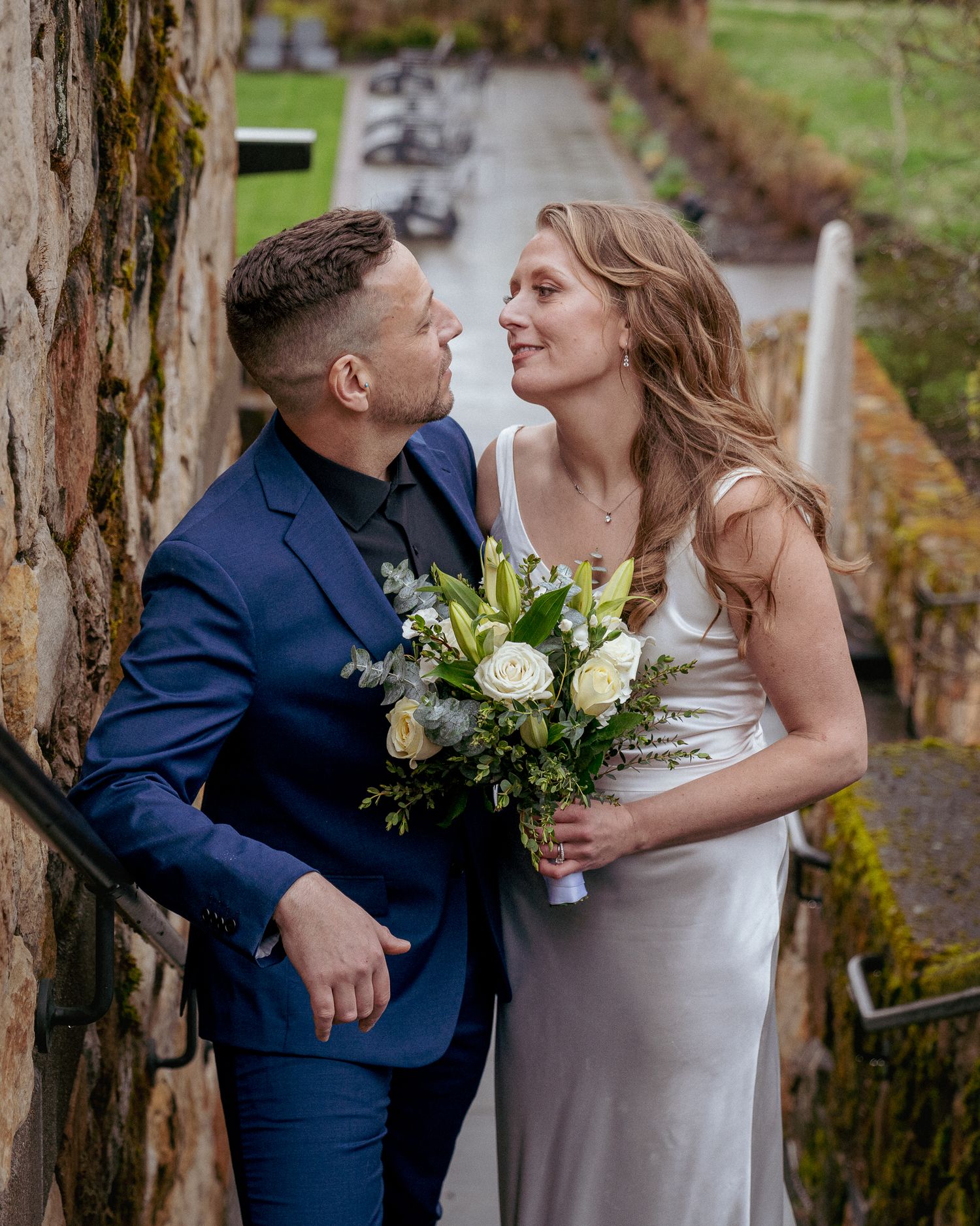 Interracial couple sharing a first look, cozy Oregon elopement.