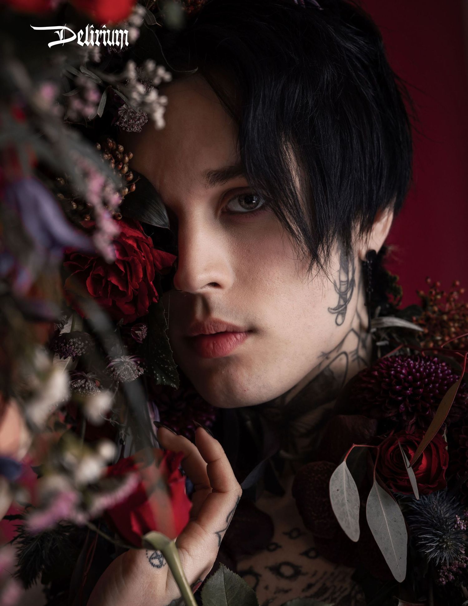 Tear sheet of Delirium Magazine featuring Louie wearing florals and lace