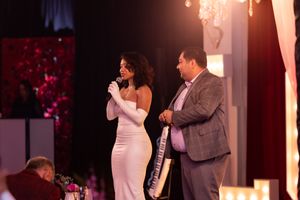 Entertainment performers engaging the crowd at an elegant evening reception.