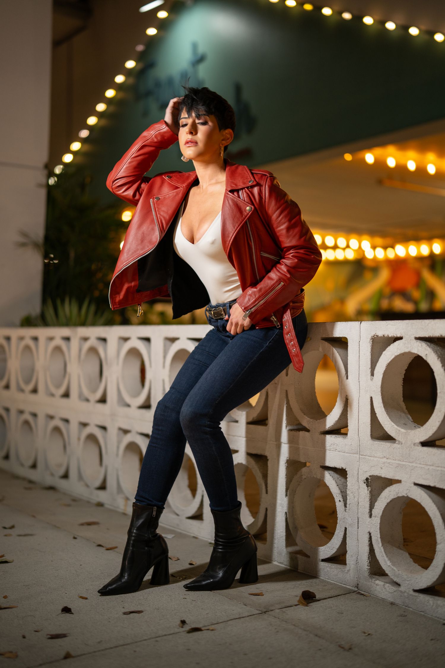 Orlando birthday photoshoot photographer Ray Alvarez — cinematic outdoor portrait session with string lights and editorial styling