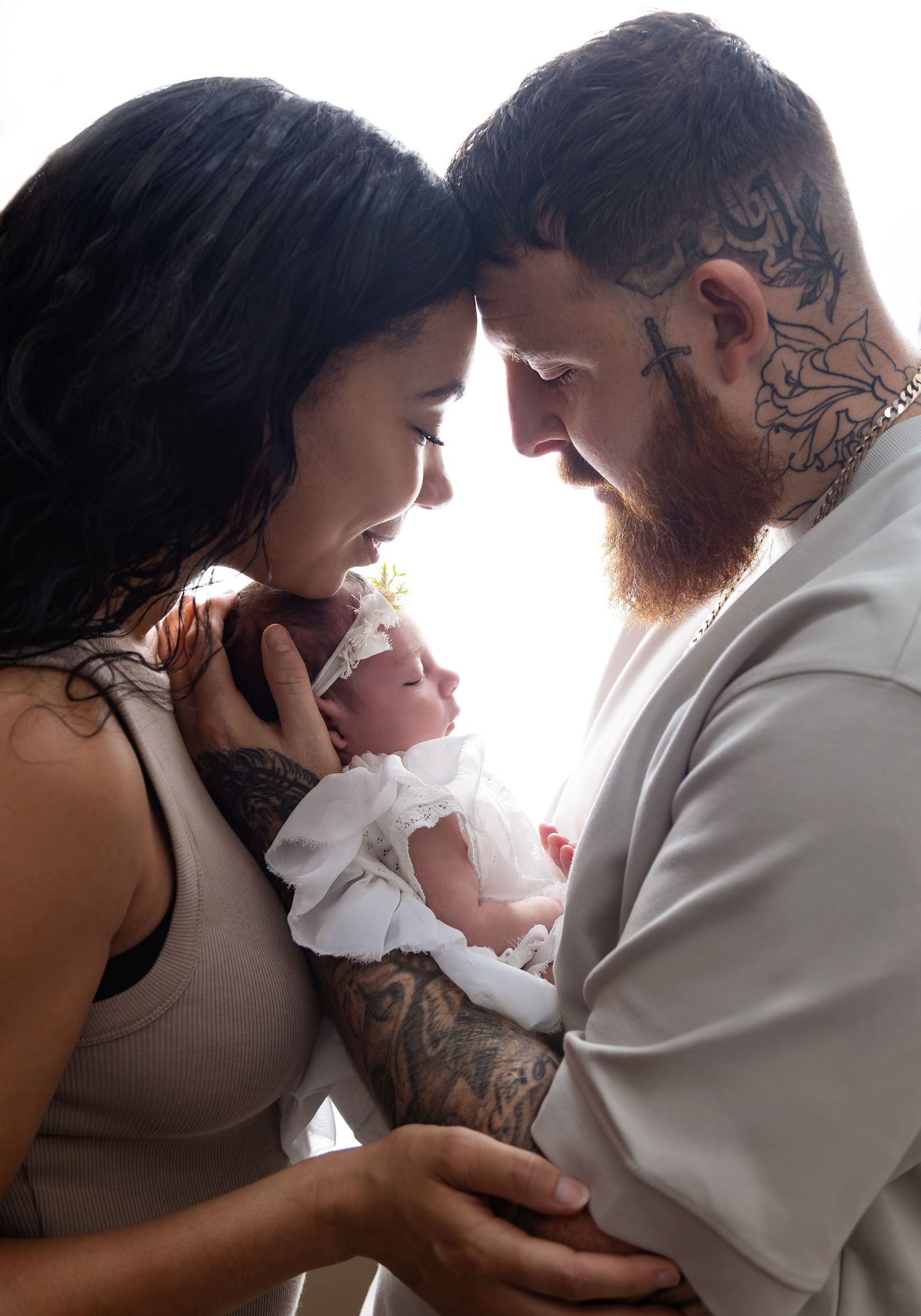 Mum & Dad holding baby, great value inclusive newborn, family photography based in coventry, warwickshire