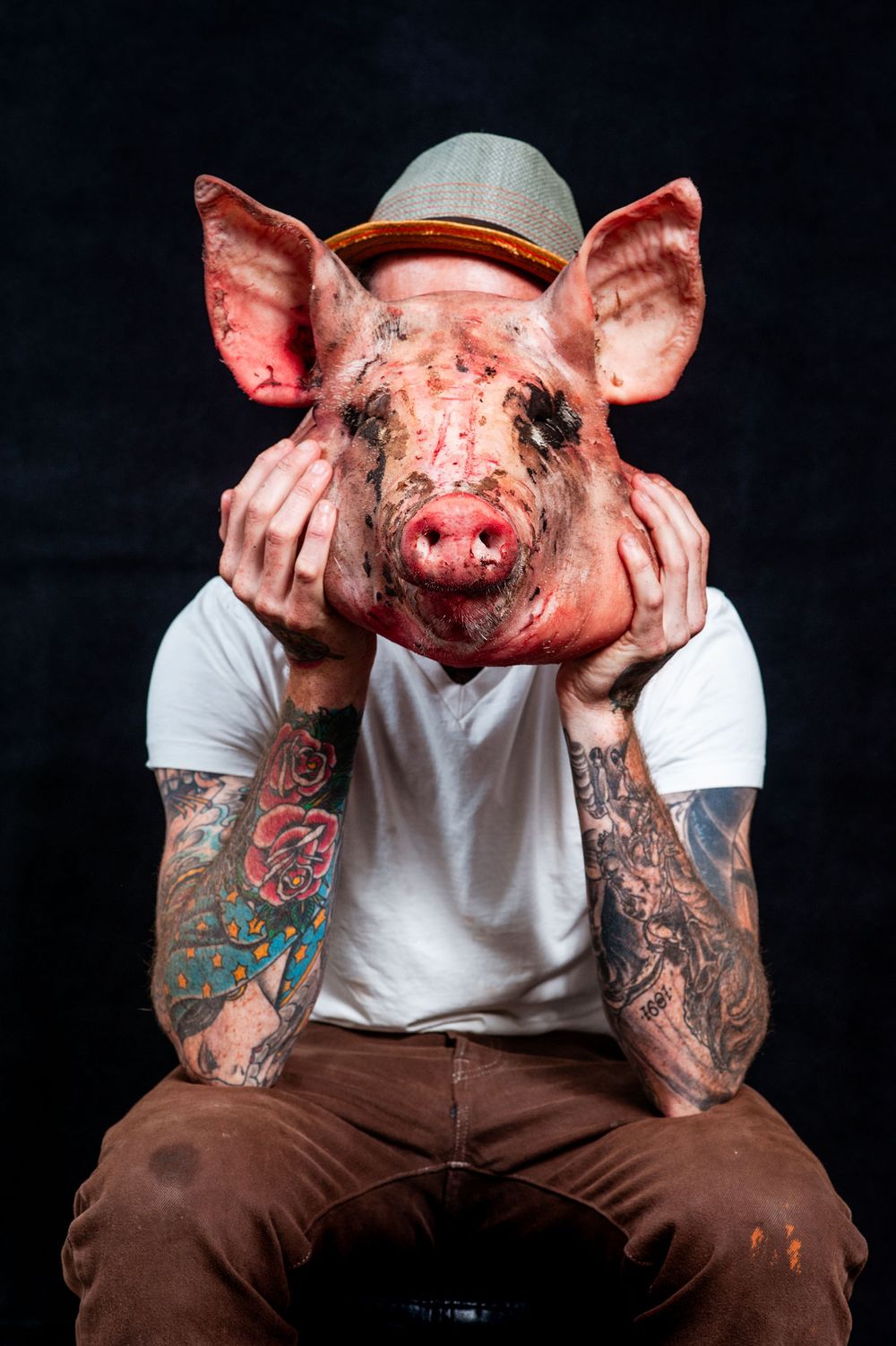 portrait of chef with a pigs head in San Luis Obispo
