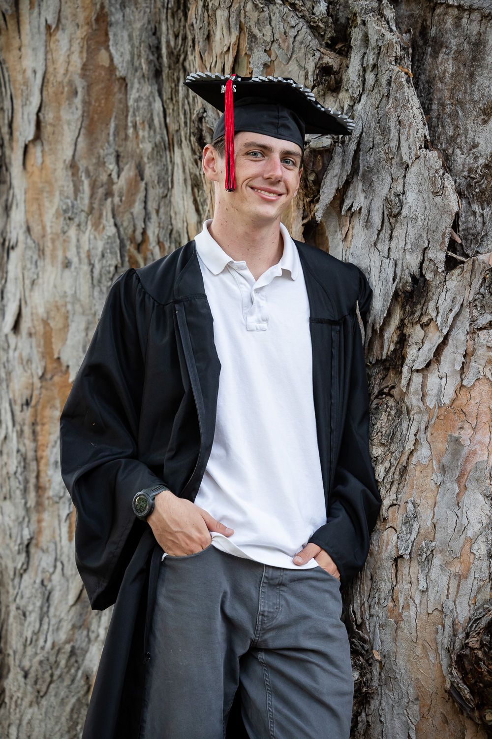Cap and gown graduation photos at outdoor senior photography portrait session in Los Gatos, California