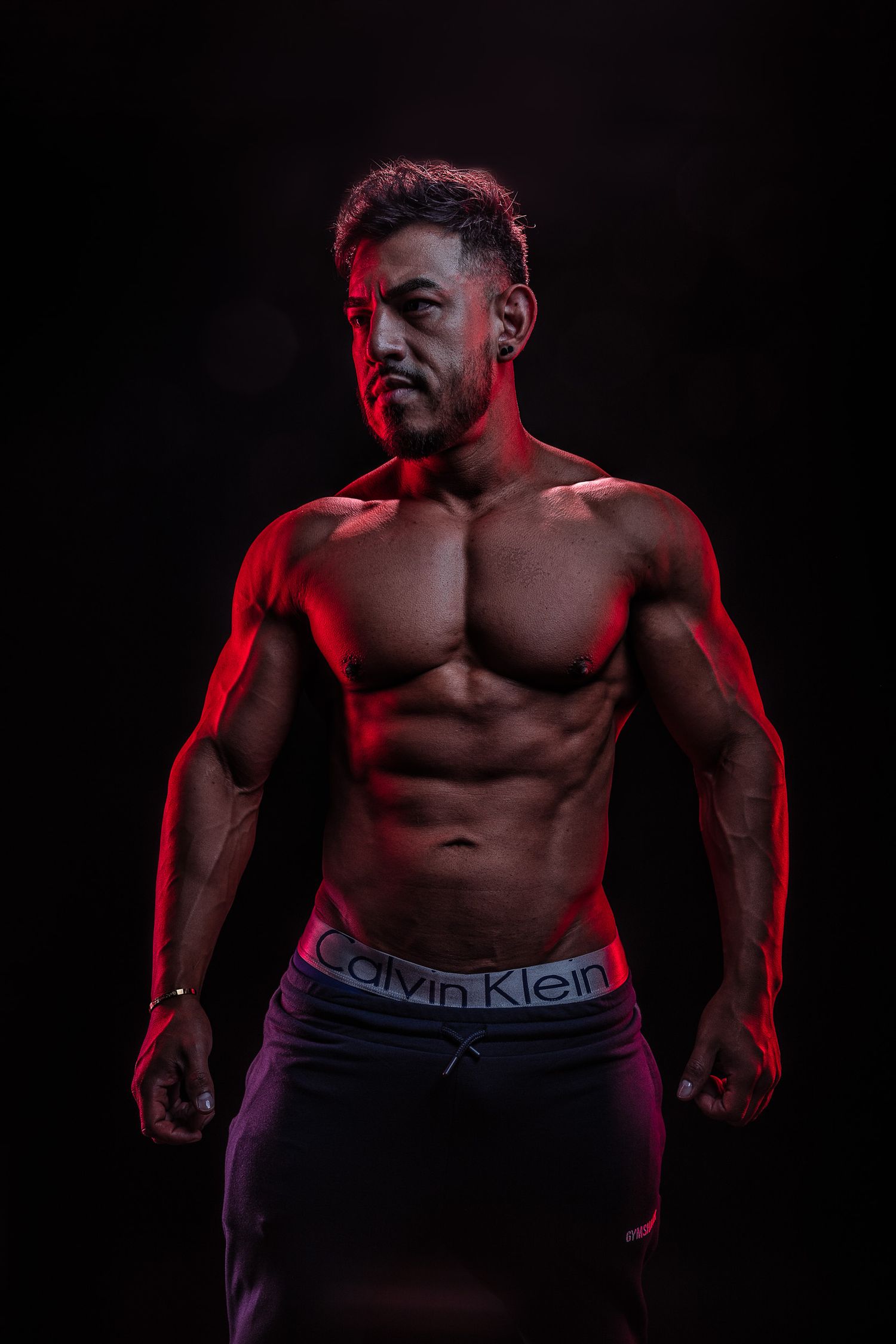 Creative color gels mens fitness portrait in San Jose