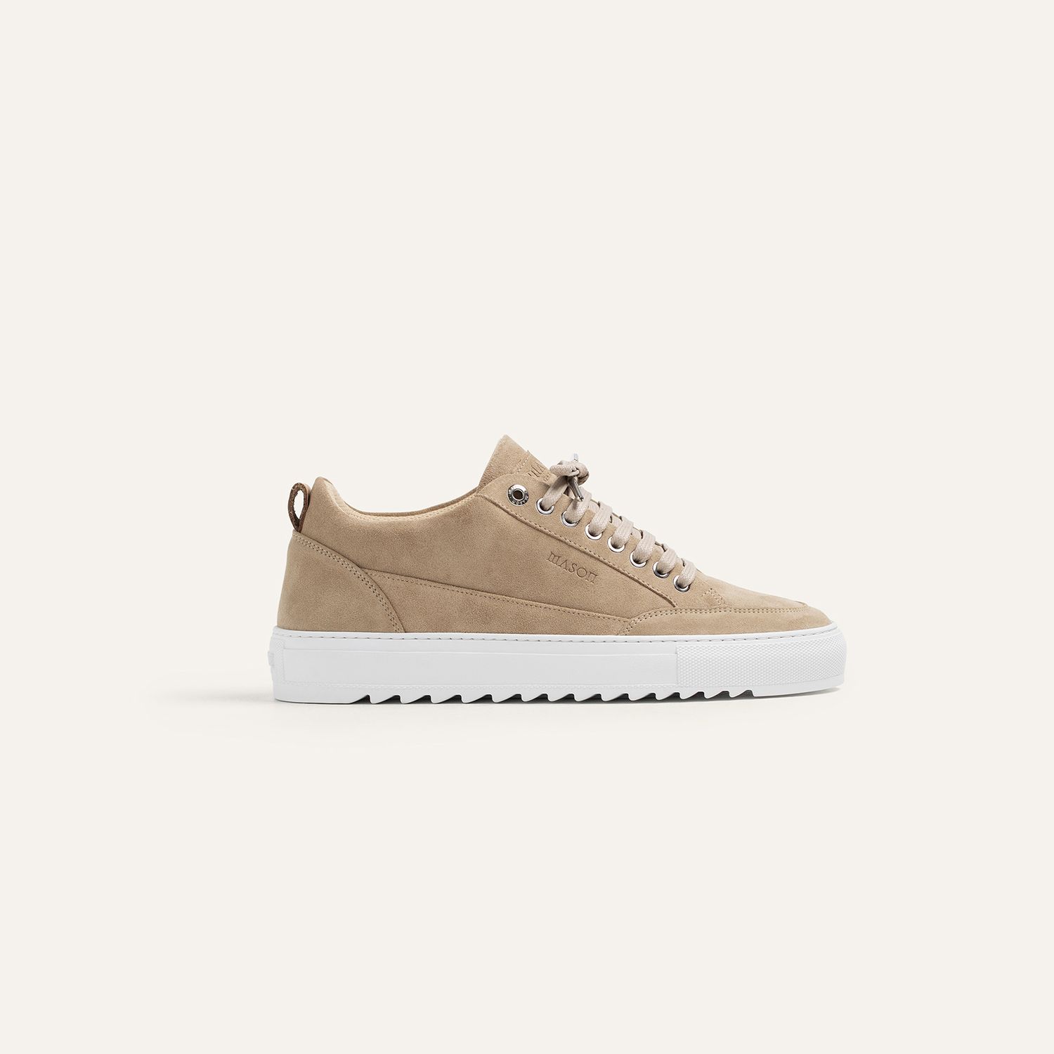 Beige suede sneaker with white sole shown from multiple angles.