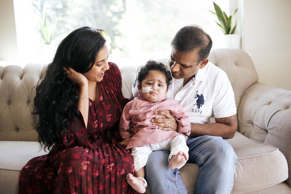 everett family photographer: a mother, father and son at their in home family photo session
