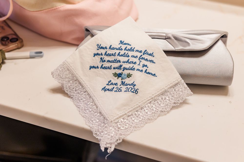 Embroidered wedding handkerchief gift for mom with sentimental blue stitched poem and lace border trim.