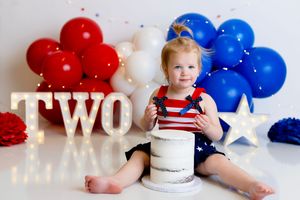 Patriotic red, white and blue birthday for second birthday celebration. Sussex County NJ Cake Smash Photographer