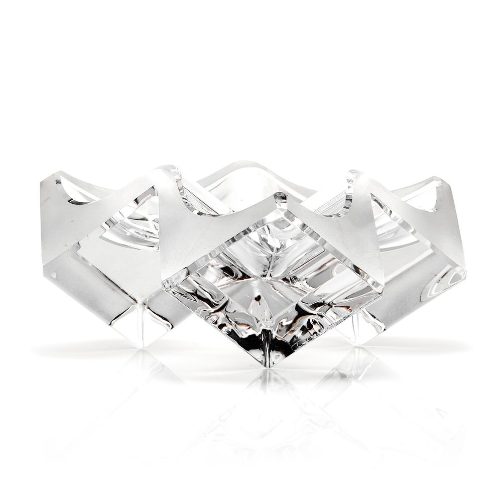 Shiny silver geometric cuff bracelet with angular zigzag pattern and crystal accent in modern minimalist style.