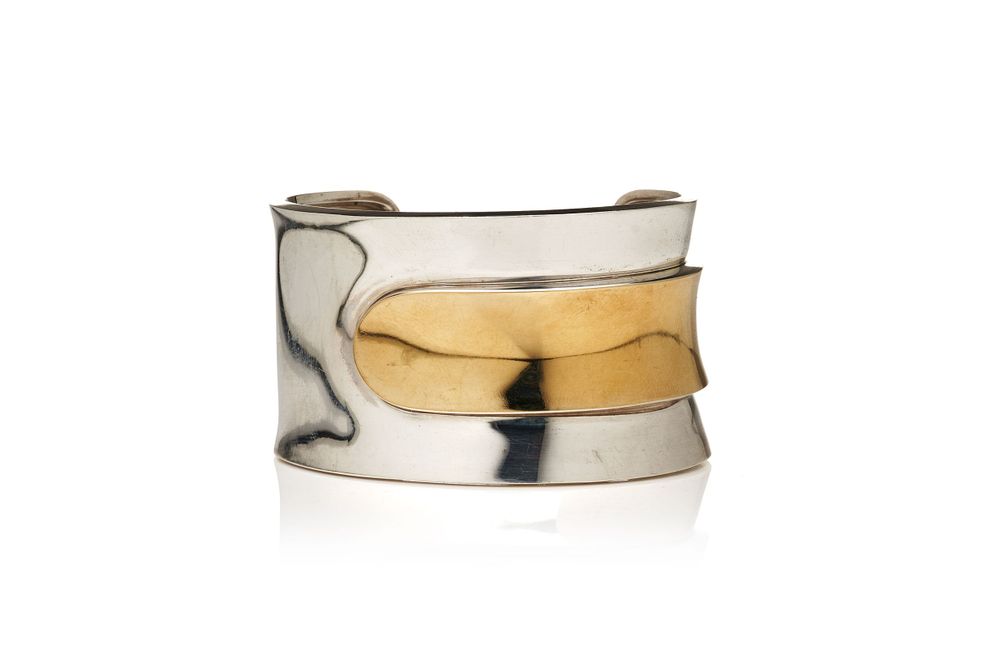 Two-tone gold and silver band rings shown in varying perspectives on white background.