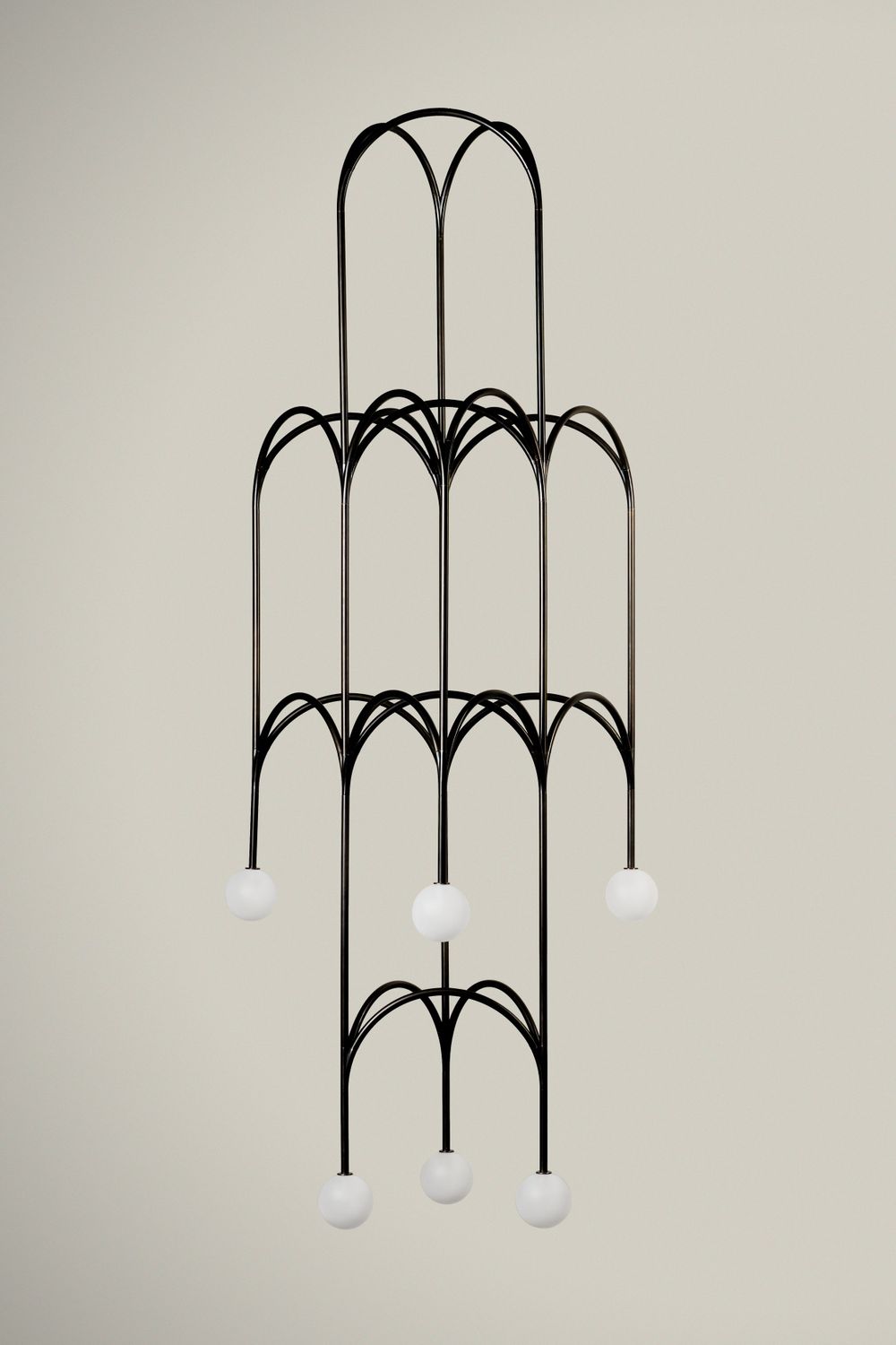 Art deco style black metal light fixture with multiple hanging pendants in an elegant cascading design.