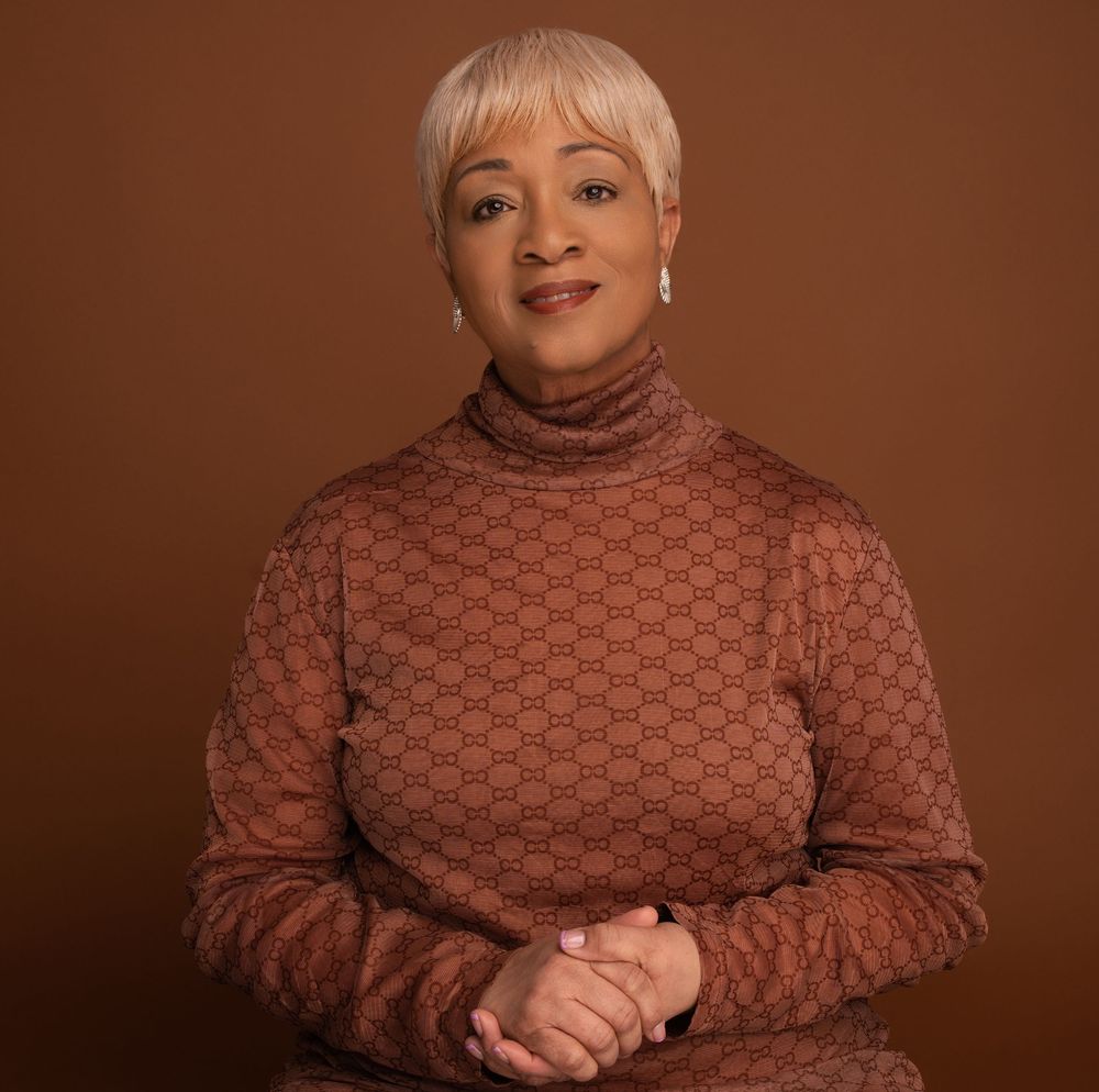 A series of portraits showing a person in a brown knit turtleneck sweater against a chocolate-colored backdrop.