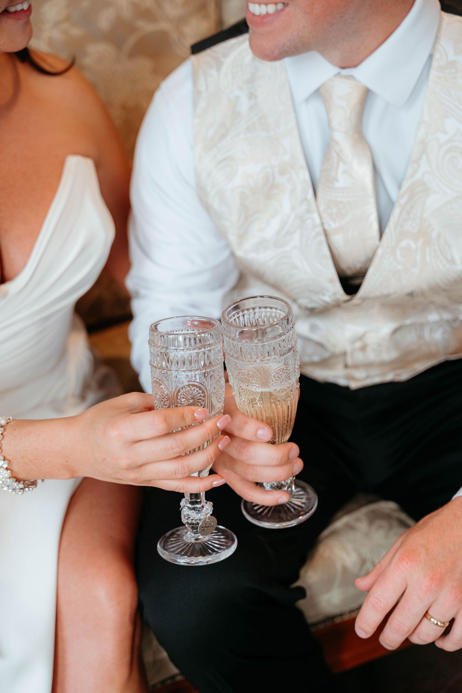 A romantic black and white photo series showing intimate moments between a couple in formal attire.