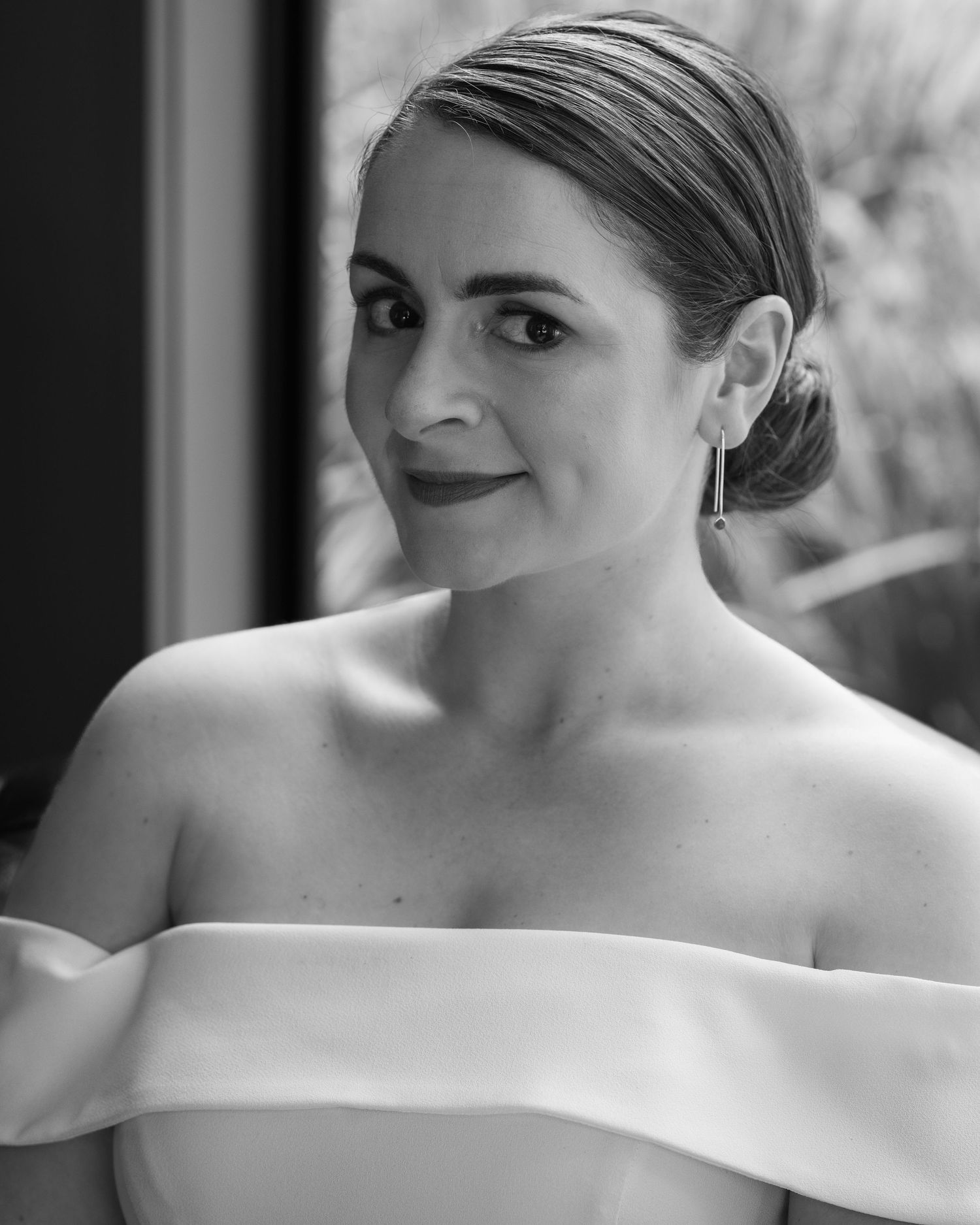 black and white photo of bride on wedding day.