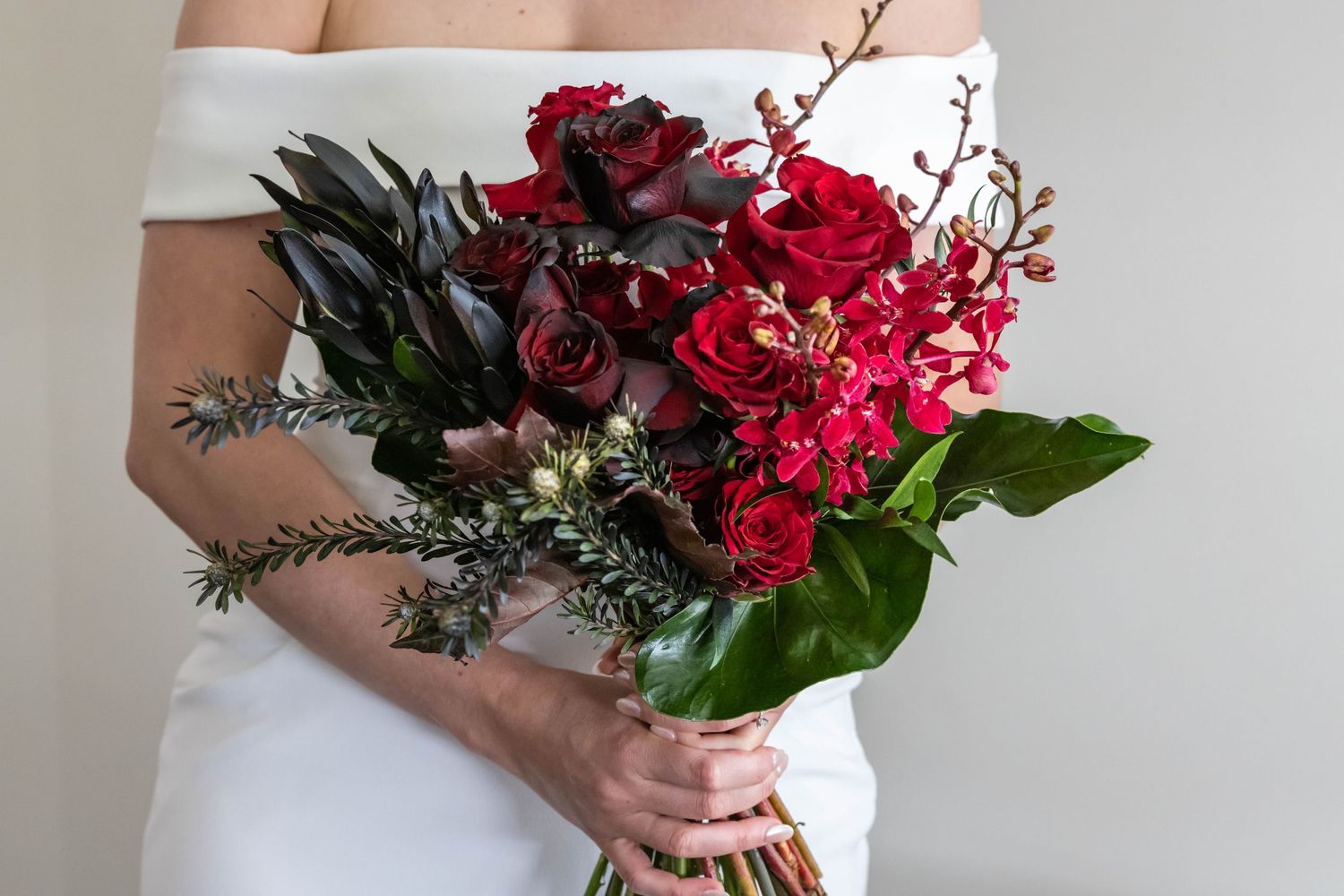 Bride holding  floral bouquet